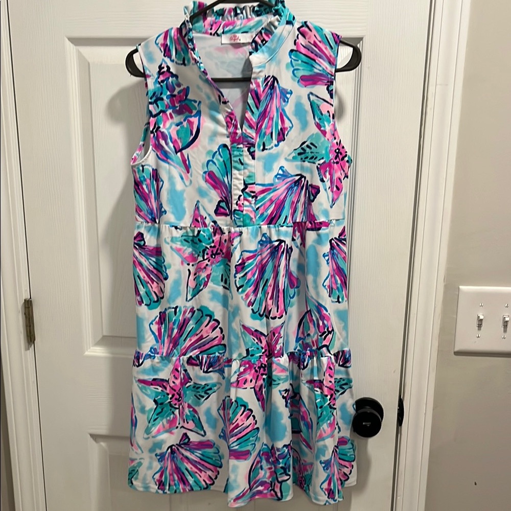 Vibrant Sleeveless Dress with Floral Pattern
